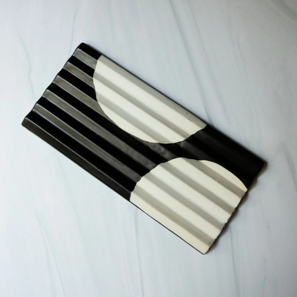 Crate and Barrel Cachuma tray made in Vietnam earthenware ceramic black white